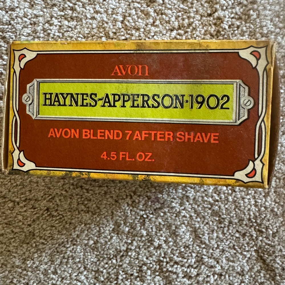 Avon vintage Haynes-Apperson 1902 After Shave still inside. green glass